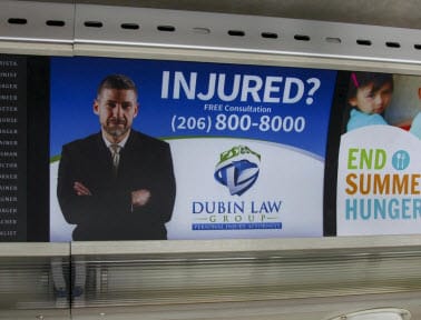 Dubin Law Group advertisement in King County Metro Station
