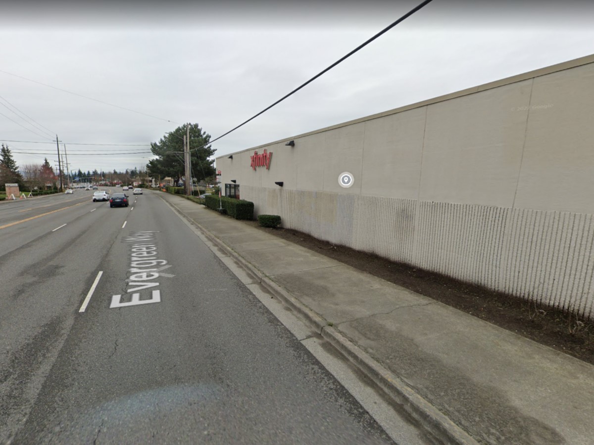 News: Truck slips off moving trailer, slams into Everett store